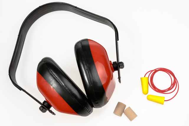 red ear protection headphones and ear pluged