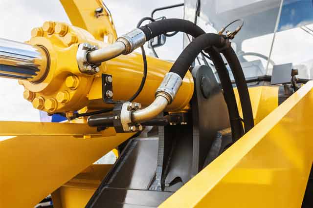 yellow hydraulic hose machine to convey fluid dynamics